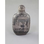 A Chinese iron and silver inlaid snuff bottle, late 19th/early 20th century, decorated with