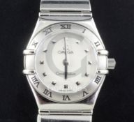 A lady's stainless steel Omega Constellation quartz wrist watch, with mother of pearl dial and dot