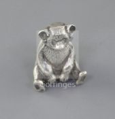 An Edwardian novelty silver pin cushion, modelled as a seated bear, Boots Pure Drug Company,