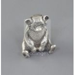 An Edwardian novelty silver pin cushion, modelled as a seated bear, Boots Pure Drug Company,