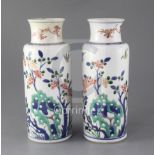 A pair of Chinese wucai cylindrical vases, Kangxi period, late 17th century, each painted with birds