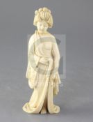 A Japanese ivory erotic figure of a bijin, early 20th century, semi-nude wearing a kimono,