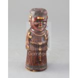 A late 19th century Benin carved ivory figure of a priest, height 6.5in.