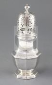 A large George I Britannia standard silver sugar caster by John Chartier, of octagonal form, with