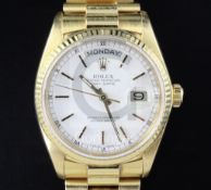 A gentlemen's 18ct yellow gold Rolex Oyster Perpetual Day Date wrist watch, with white dial, baton