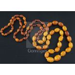A single strand graduated amber bead necklace, possible two necklaces merged?, gross weight 93