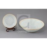 A Chinese Qingbai moulded dish and a bowl, Yuan dynasty (1271-1368), the small dish moulded in