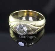 A gentlemen's 18ct yellow gold and gypsy set solitaire diamond ring, the stone weighing 1.18ct, size