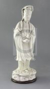 A large Chinese Dehua blanc de chine figure of Guanyin, Kangxi period, height 39cm, restored