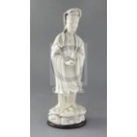 A large Chinese Dehua blanc de chine figure of Guanyin, Kangxi period, height 39cm, restored