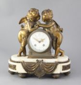 An early 20th century French ormolu mounted marble mantel clock, retailed by Charles Frodsham, the