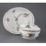 A Sevres quatrelobed dish and a similar ecuelle and cover, c.1753 and 1763, both painted with floral