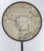Two Chinese painted silk rigid circular fans, Guangxu period (1875-1908), the first painted with