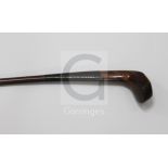 An early 20th century mahogany Sunday stick, the head with lead back weight and bone plate to the