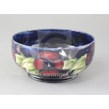 A Moorcroft pansy pattern bowl, diameter 8.25in.