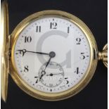 A 1940's 18ct gold hunter keyless lever pocket watch, with engraved inscription and Arabic dial with