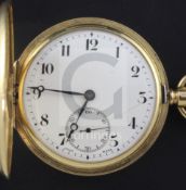 A 1940's 18ct gold hunter keyless lever pocket watch, with engraved inscription and Arabic dial with