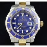 A gentlemen's stainless steel and yellow gold Rolex Oyster Perpetual Date Submariner wrist watch,