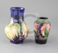 Two Moorcroft leaf and berry pattern vases, c. 1940s both with impressed marks Moorcroft Potter to