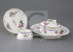 A group of Sevres table wares, c.1769-1774, each painted with floral sprays within blue line and