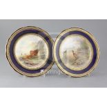 A pair of Royal Worcester cabinet plates, decorated by James Stinton, with Highland cattle and