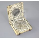 A 17th/18th century ivory diptych compass, width 2in.