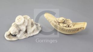 Two Japanese ivory netsuke, 19th century, the first carved as a man recumbent upon a boat,