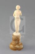 Joe Descamps. A 1930's carved ivory figure of a nude, signed, height 5.75in.