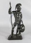 After the antique. A bronze figure of a warrior standing holding a spear shaft, shield and sword,