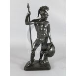 After the antique. A bronze figure of a warrior standing holding a spear shaft, shield and sword,