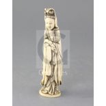 A Chinese walrus ivory figure of a Guanyin, 18th/19th century, the figure holding a ruyi sceptre