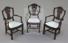 Denis Hillman. Three Hepplewhite style mahogany shield back miniature dining chairs, the splats