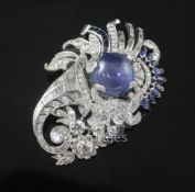 A modern ornate white gold and platinum, sapphire and diamond set clip brooch, of fan and