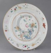 A Chinese famille rose charger, Qianlong period painted with a crane, other birds, fence, rockwork