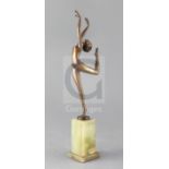 A Lorenzl Art Deco bronze figure of a dancer, signed, raised on a green onyx base, height 13in.