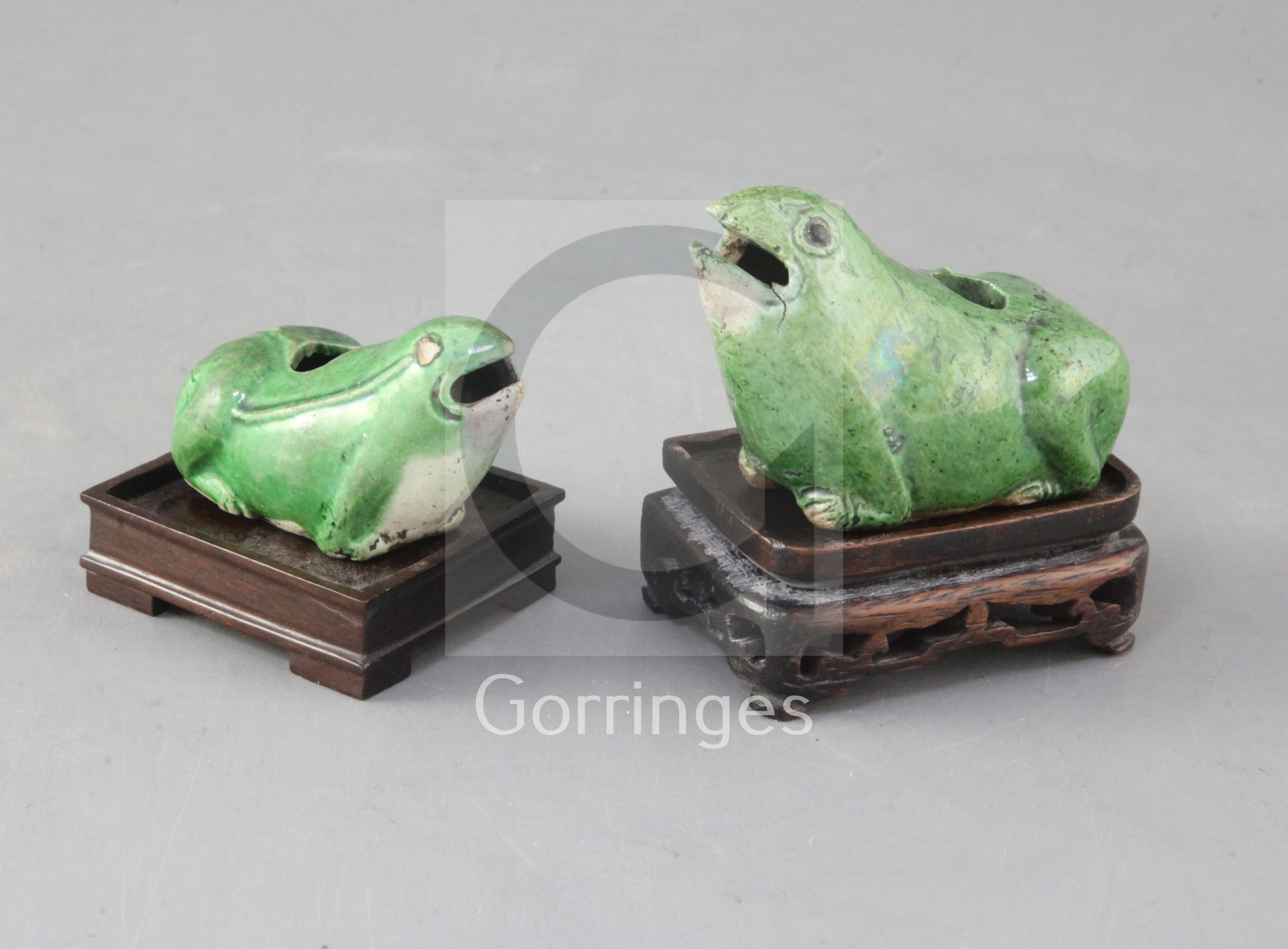 A pair of Chinese green glazed biscuit 'frog' water droppers, 18th century, each bearing Frank