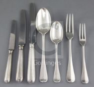 A canteen of Victorian silver Hanoverian rat tail pattern flatware for twenty four, by Aldwinkle &