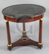 An Empire ormolu mounted mahogany centre table, with circular granite top, Diam.2ft 8in. H.2ft 6in.