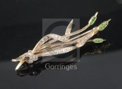 A yellow metal, diamond and gem set "bullrushes" brooch, 52mm.