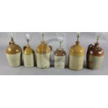 A collection of six Victorian earthenware jars, including a wine flagon incised Vallance, Catt & Co,