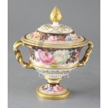 A Royal Crown Derby twin handled urn and cover, painted by Albert Gregory, painted with continuous