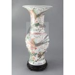 A Chinese famille verte baluster vase, Kangxi period painted with phoenixes and qilin amid
