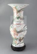 A Chinese famille verte baluster vase, Kangxi period painted with phoenixes and qilin amid