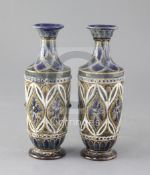 A pair of Doulton Lambeth stoneware vases, decorated by Elizabeth Fisher, with stylised foliate