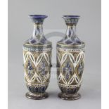 A pair of Doulton Lambeth stoneware vases, decorated by Elizabeth Fisher, with stylised foliate