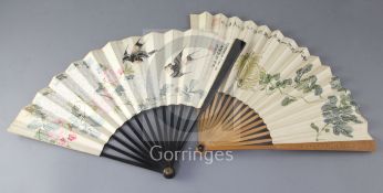Two Chinese concertina fans, Republic period, the first a paper leaf fan painted birds amid flowers,