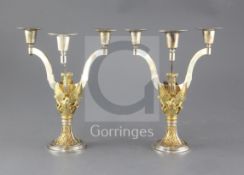 A pair of limited edition 1980's parcel gilt silver St. Pauls' Cathedral Wedding candelabra, to
