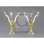 A pair of limited edition 1980's parcel gilt silver St. Pauls' Cathedral Wedding candelabra, to