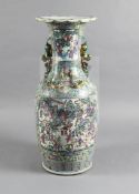 A massive Chinese famille rose floor vase, mid 19th century, painted with reserves of warriors in