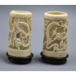 A pair of Chinese ivory 'dragon' vases, late 19th century